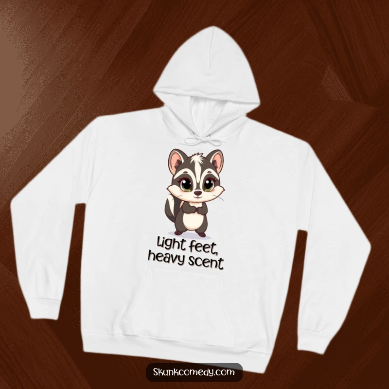 Funny skunk hoodie showing a skunk with wide, innocent eyes happily skipping along, perfect for cozy, cheerful days.