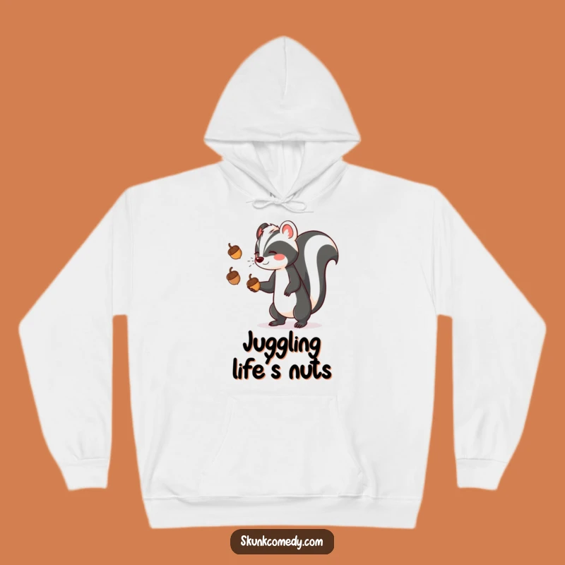 Cozy Funny Skunk Juggling Hoodie: Warmth Meets Whimsical Humor