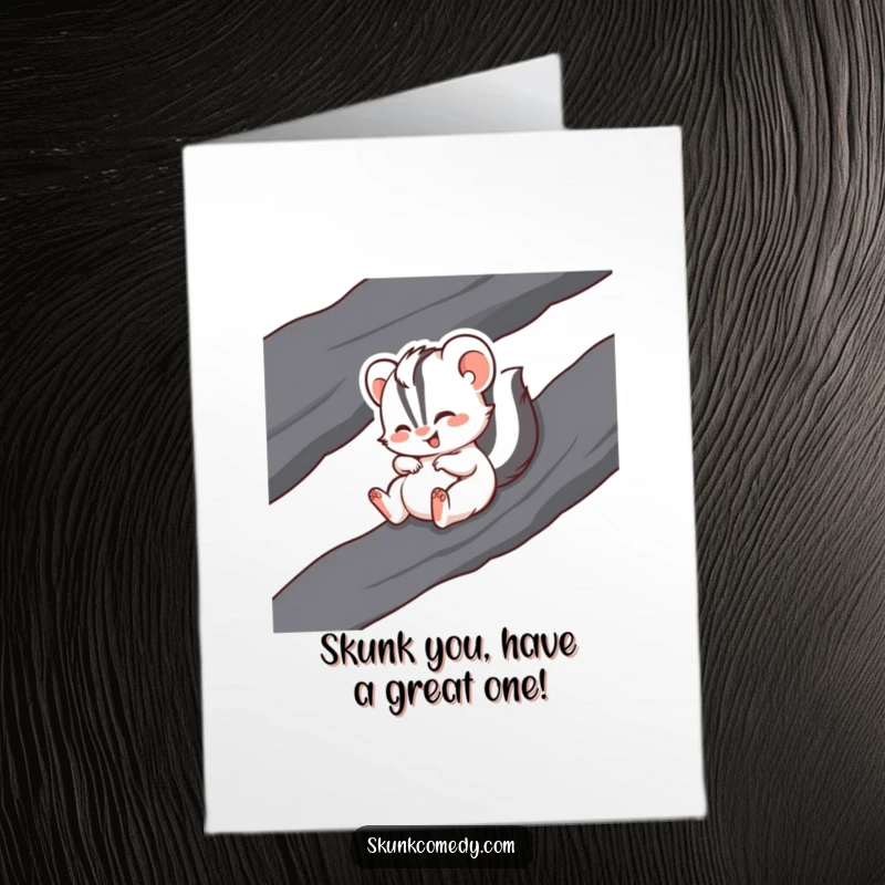 Funny free printable birthday card: A joyful skunk slides down a rock, giggling uncontrollably with pure delight.