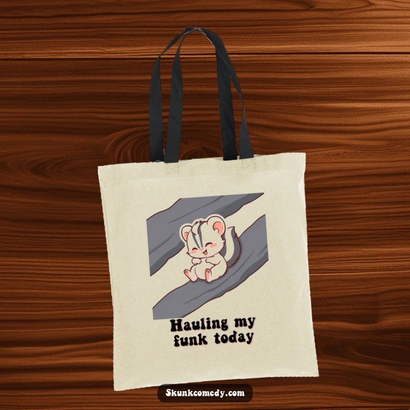 Funny tote bag illustration of a gleeful skunk sliding down a dark rock with a huge grin.